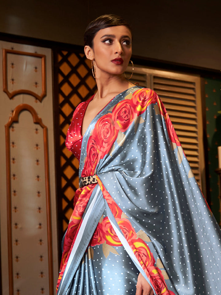 Elegant cadet grey and fire engine red Bollywood-style crepe saree adorned with digital prints, suitable for festive celebrations.