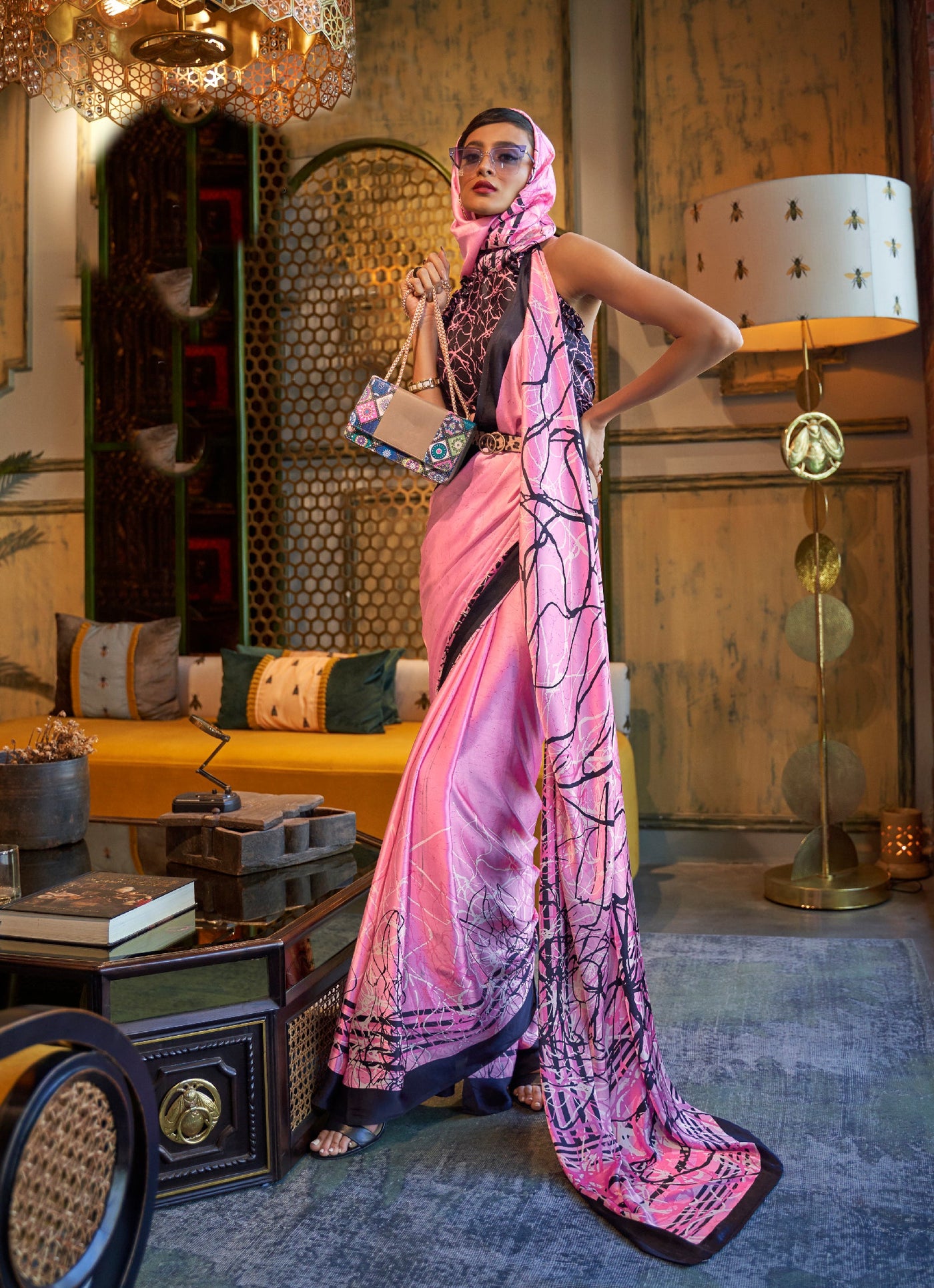 Carnation pink and licorice Bollywood crepe saree featuring stylish digital print, perfect for festive occasions.