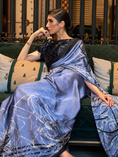 Elegant Carolina blue and licorice Bollywood-style crepe saree adorned with stylish digital prints, suitable for festive celebrations.