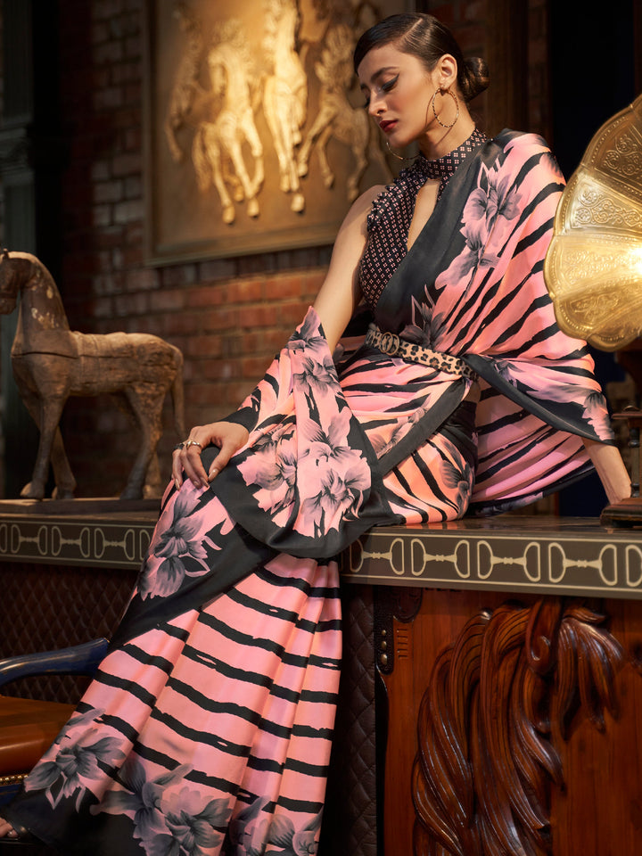 Elegant cherry pink and ebony Bollywood-style crepe saree adorned with digital prints, suitable for festive celebrations.