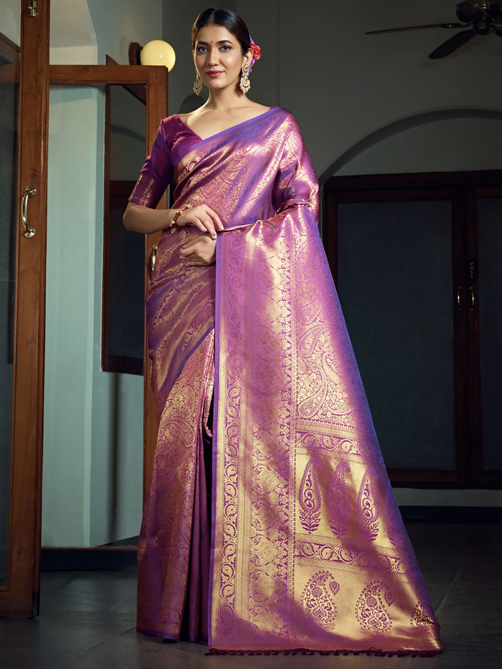 Model wearing the Purple Kanjivaram Silk Saree with gold zari, front view highlighting pleats and pallu drape.