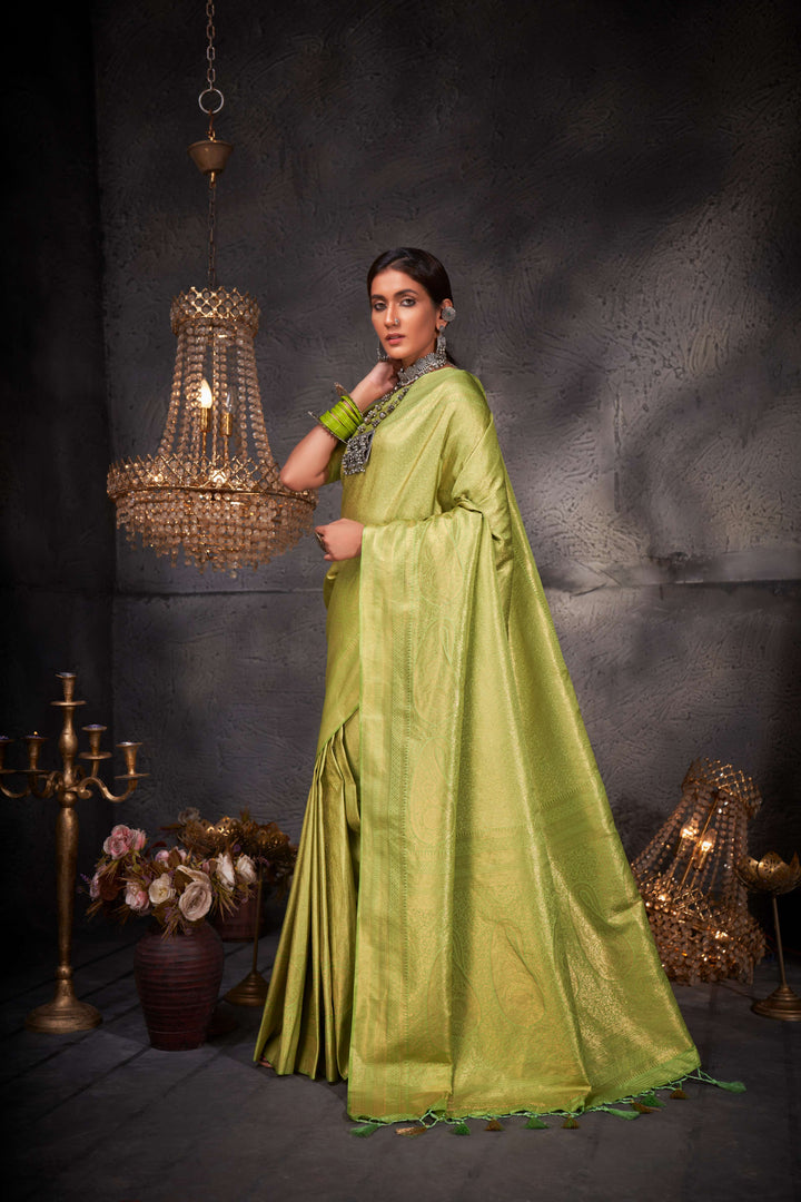 Side profile of the model, highlighting the elegant fall and sheen of the silk blend.