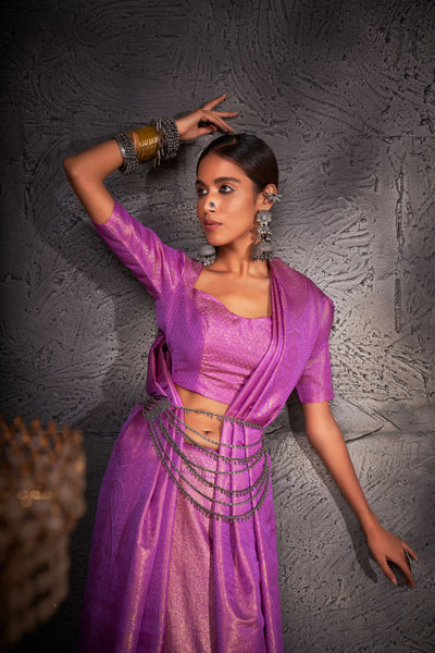 Flat lay of the saree and blouse piece showing fabric texture and color consistency.