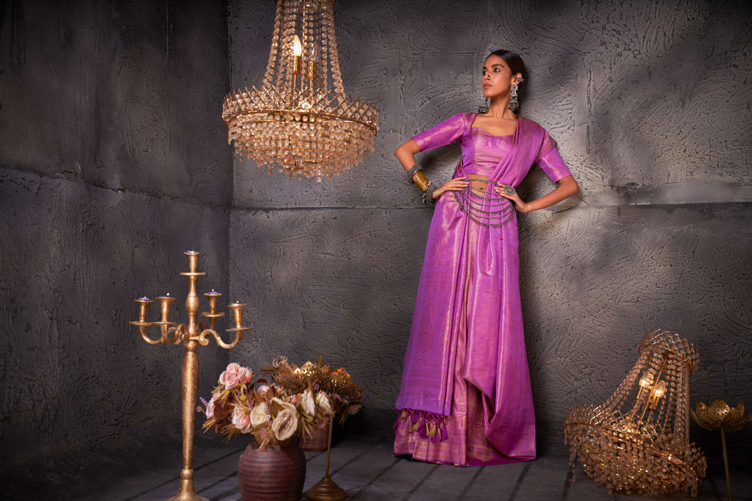 Full-length view of model showcasing the lilac Kanjeevaram saree with elegant gold zari work.