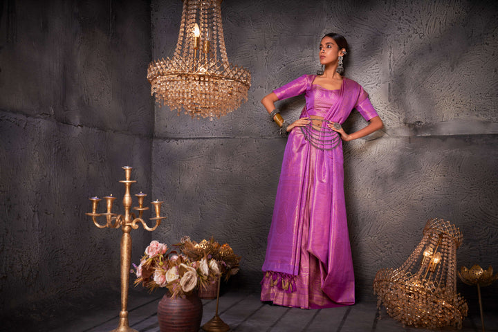 Full-length view of model showcasing the lilac Kanjeevaram saree with elegant gold zari work.