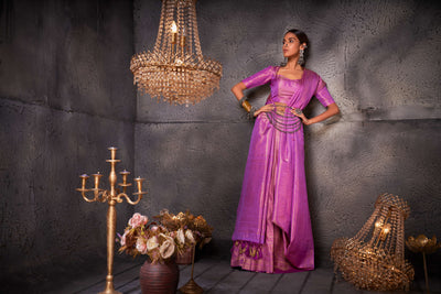 Full-length view of model showcasing the lilac Kanjeevaram saree with elegant gold zari work.