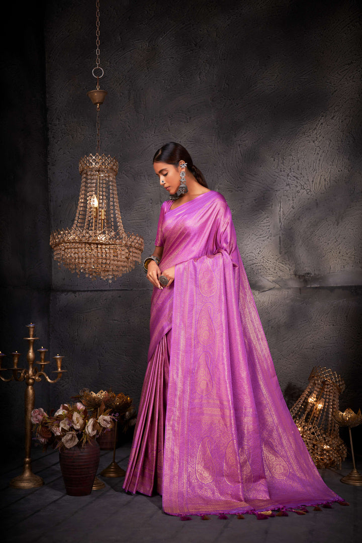 Full-length view showcasing the flowing drape and luxurious sheen of the saree.