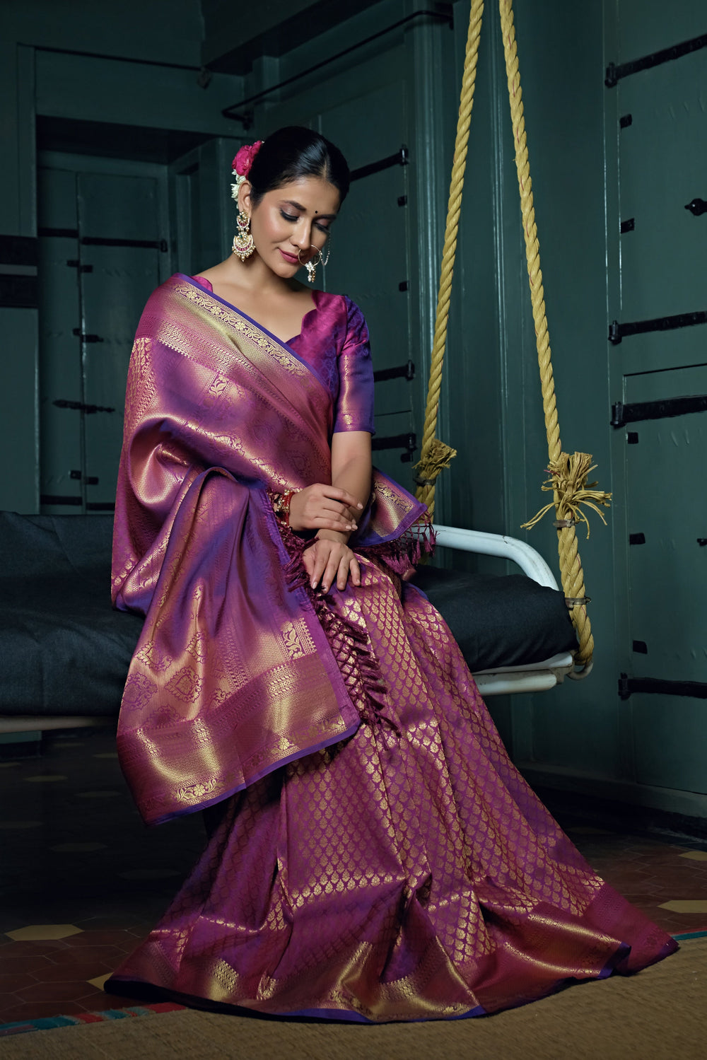 Unstitched blouse piece displayed with the saree’s body and border.