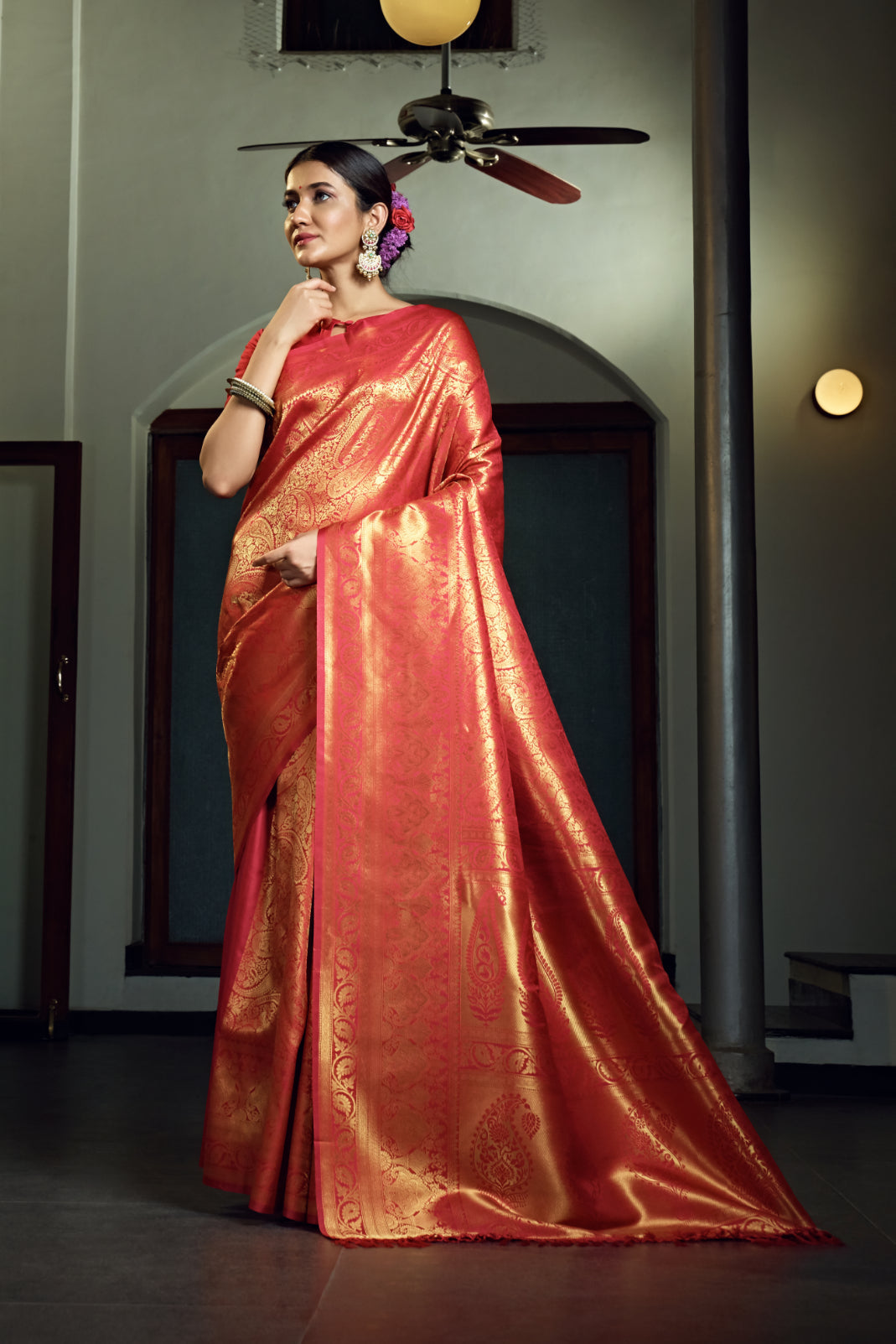 Flat-lay of the saree, showing the blouse piece and border detailing.