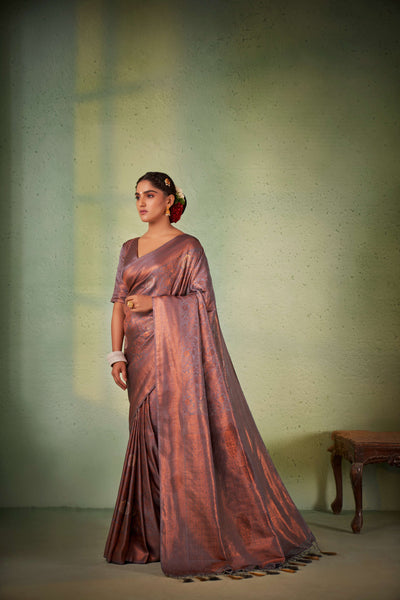 Side profile showing fluid silk texture and zari richness.