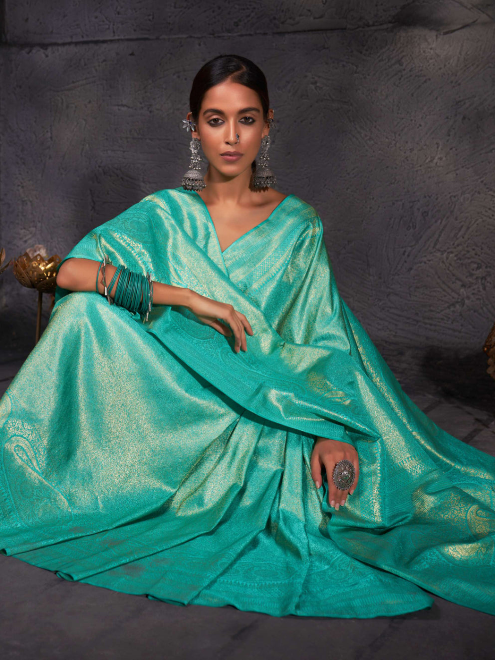 Over-the-shoulder shot capturing the fine craftsmanship and golden glow.