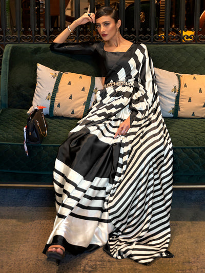 Elegant Bollywood-style crepe saree in White Smoke and Licorice hues, adorned with stylish digital prints for a modern festive appeal.
